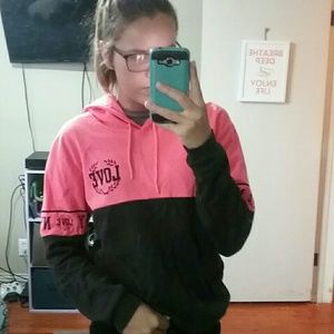 Black and pink ON FIRE hoodie.
